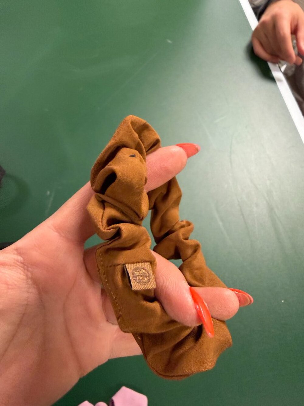 brown lululemon scrunchie